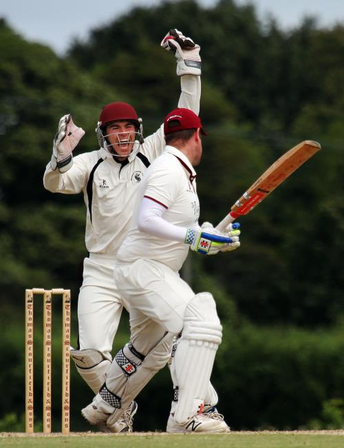Sean Hannon celebrates dismissing  Dan Cherry